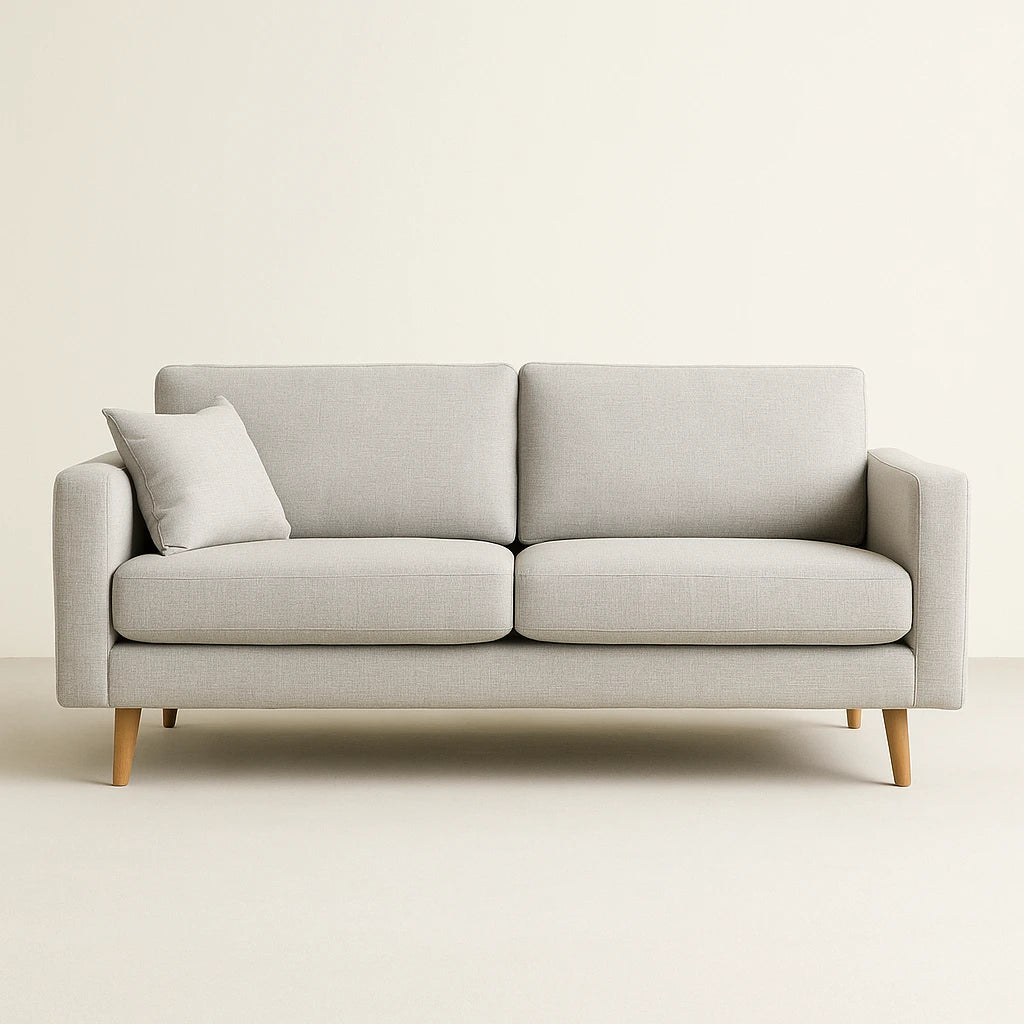 Canapé moderne beige dans un intérieur épuré – mobilier salon et séjour disponible dans notre magasin de meubles à Seraing